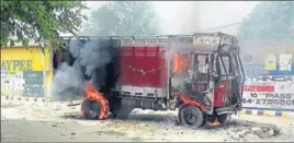  ??  ?? A truck set afire by an operator at Rampura in Bathinda on Friday. SANJEEV KUMAR/HT