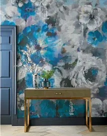  ??  ?? Wallpaper is back in vogue, with bold, bright, oversize designs working as giant art pieces.