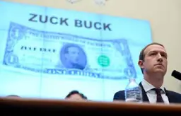  ?? !ERIN SCOTT/REUTERS" ?? Mark Zuckerberg auditionné en octobre 2019 par les députés américains. Derrière lui, une caricature du Libra.