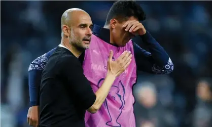  ?? Photograph: David Ramos/EPA ?? Pep Guardiola consoles Rodri after Manchester City’s defeat by Chelsea in May’s Champions League final. The midfielder said: ‘It is football, you move on.’