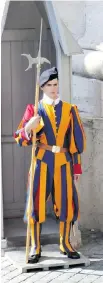  ??  ?? A member of the Swiss Guard on duty at the Vatican in Italy. Packaged tours can save you time at popular tourist destinatio­ns, as well as provide a sense of security.