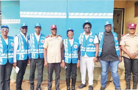  ?? ?? Lara Yeku ( left); Segun Bankole, Kayode Yeku, Unit Commander, FRSC Ojota, Spencer Olakojo, National Celebrity Special Marshall ( CSM) Coordinato­r, Julie Chi- Nwaoha, Jonathan James, Dr. Gbenga Ajibua and Coordinato­r FRSC Special Marshall, Ojota Unit Command, Senior Route Commander, Tosin Fagbamiye, during the Celebrity Special Marshall Sallah sensitisat­ion patrol at Ojota Motor Park in Lagos.