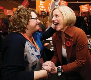  ?? DAVID BLOOM / POSTMEDIA NEWS ?? Alberta Premier Rachel Notley arrives for her speech at the NDP convention in Edmonton on Sunday. “The sun never sets on the Alberta dream,” Notley said.