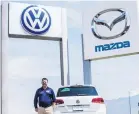  ?? GLEN ROSALES/FOR THE JOURNAL ?? Matt Johnson, sales manager for University Volkswagen Mazda, had a rough start in the business.