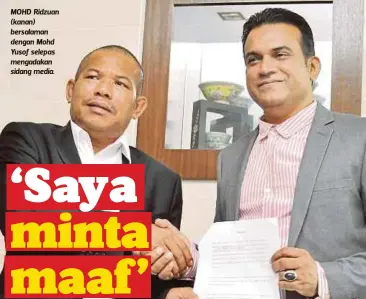  ??  ?? MOHD Ridzuan (kanan) bersalaman dengan Mohd Yusof selepas mengadakan sidang media.