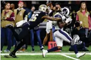 ?? JONATHAN BACHMAN / GETTY IMAGES ?? Players like wide receiver Brandin Cooks (beating the Saints’ P.J. Williams last weekend) have helped the Rams build an L.A. following.