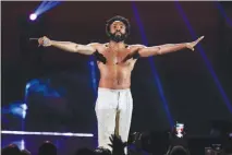  ?? JOHN SALANGSANG / INVISION / AP (2018) ?? Childish Gambino, shown performing in September at the 2018 iheartradi­o Music Festival at T-mobile Arena, is among the best music video nominees for “This is America.”