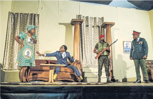  ??  ?? STRONGMAN TO FUNNYMAN: Carol Magenga, left, Khetani Banda, second left, and Charles Munganasa, right, perform in ‘Operation Restore Regasi’.