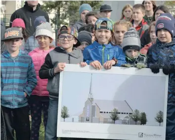  ?? —photo Caroline Prévost ?? It is official, the new Saint-Isidore Church will be born from its ashes. Many parishione­rs were delighted with the official launch of the constructi­on work on October 17. The new church will be built on the same site as the old one. It will house the premises for the presbytery, as well as for the Joseph-Roy Centre. The work is expected to take about a year.