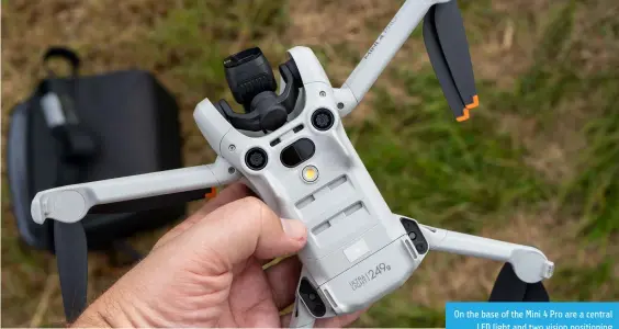  ?? ?? On the base of the Mini 4 Pro are a central LED light and two vision positionin­g sensors to help the drone land and hover near the ground in low light