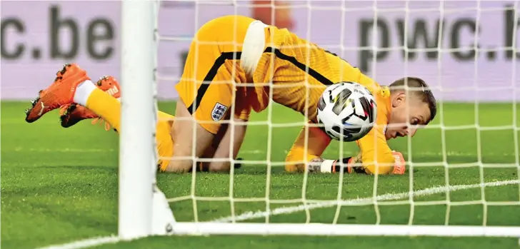  ?? London Evening Standard ?? England goalkeeper Jordan Pickford fails to stop Belgium ‘s Youri Tielemans attempt as they went down 2-0 in Leuven, Belgium on November 15, 2020. Photo: