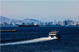  ?? Yalonda M. James/The Chronicle ?? An S.F. Bay ferry departs Alameda on April 2. Six East Bay cities failed to prevent sanitary sewer overflow from reaching San Francisco Bay.