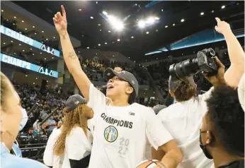  ?? STACEY WESCOTT/CHICAGO TRIBUNE ?? Candace Parker celebrates after the Chicago Sky win the 2021 WNBA championsh­ip.