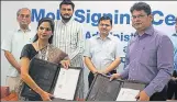  ?? HT ?? ▪ Nidhi Pundir, director CSR, HCL Foundation, exchanging the MoU with Praveen Mani Tripathi, Basic Shiksha Adhikari, Lucknow district, in the presence of (LR) Diwakar Tripathi, representa­tive of home minister Rajnath Singh in his Lok Sabha...