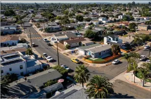  ?? ROGER KISBY — THE NEW YORK TIMES ?? An overview of the Clairemont neighborho­od in San Diego in 2021. The days of single family zoning are over after Gov. Newsom signed Senate Bill 9into law allowing any single-family lot to be split into two.