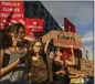  ?? KENNY HOLSTON THE NEW YORK TIMES ?? Climate activists block gates to the Congressio­nal Baseball Game at Nationals Park during a demonstrat­ion in Washington last week.