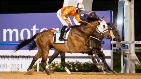  ??  ?? Pat Dobbs pulling off a 25/1 shock on Al Tarig at Meydan on Thursday, edging out Mikael Barzalona on Important Mission.