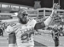  ?? Brad Tollefson / Associated Press ?? Charles Omenihu’s first game with Texas was a loss at Notre Dame in 2015. He said the program has been on a rocky path but thinks the Longhorns have a positive future.