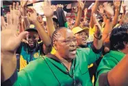  ?? THEMBA HADEBE/ASSOCIATED PRESS ?? Delegates gesture as they wait for the delayed start of the ruling African National Congress elective conference in Johnannesb­urg on Saturday.