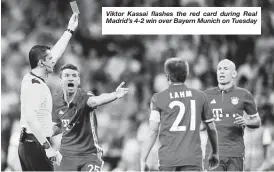  ??  ?? Viktor Kassai flashes the red card during Real Madrid’s 4-2 win over Bayern Munich on Tuesday