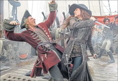  ?? ?? Clara Paget fights ship crew as pirate Anne Bonny in TV series Black Sails