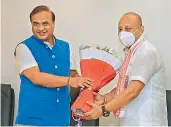  ?? PTI ?? Assam Chief Minister Himanta Biswa Sarma with Sushanta Borgohain, who resigned from Congress to join BJP. —