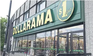  ?? PAUL CHIASSON THE CANADIAN PRESS FILE PHOTO ?? Dollarama workers in Quebec described a lack of PPE, inadequate physical distancing at warehouses and complained of improper barriers between staff and customers at retail stores.