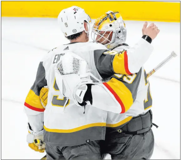  ?? Lindsey Wasson The Associated Press ?? Goalie Laurent Brossoit, greeted by center Jack Eichel, is the only Knights player this season to be named an NHL star of the week.