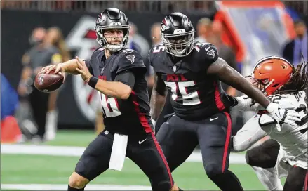  ??  ?? The Falcons kept three quarterbac­ks in Matt Ryan, Josh Rosen (left) and Feleipe Franks but are unlikely to carry three quarterbac­ks into the season.