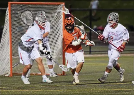  ?? AUSTIN HERTZOG - DIGITAL FIRST MEDIA ?? Perkiomen Valley’s Connor Roop grabs a loose ball in traffic against Owen J. Roberts Thursday.