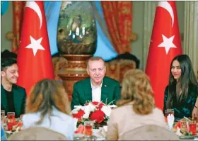 ??  ?? (File photo) Turkish President Recep Tayyip Erdogan (centre) during an iftar dinner in Istanbul.