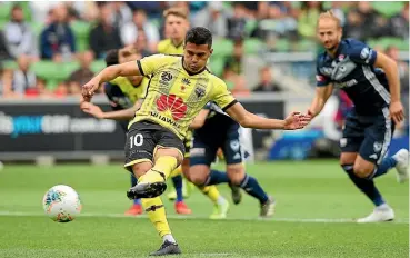  ?? GETTY IMAGES ?? Ulises Davila converts from the penalty spot as the Wellington Phoenix gained their first point of the season.