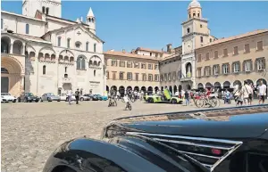  ?? ?? iiWinemake­r Alessandro Medici discusses the fruits of his labours with Xanthe Clay iAn exhibition of classic cars in the Piazza Grande, Modena
ihTimeless landscape: the countrysid­e near Reggio Emilia