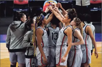  ?? Eric Gay / Associated Press ?? Connecticu­t players huddle before a women’s Final Four NCAA college basketball tournament semifinal game against Arizona at the Alamodome in San Antonio, Texas, on April 2.