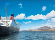  ?? Alexander Matthews ?? Wild crossing: The CalMac ferry on its way to Port Askaig on Islay, little more than a pier, a pub and an hotel. /