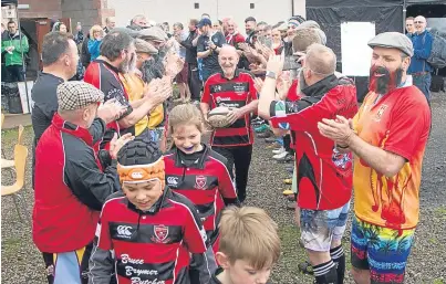  ?? Reid. Picture: Paul ?? A hero’s welcome for Fred Crowe at Inchmacobl­e Park, Forfar.