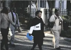  ?? NELL/THE POST AND COURIER VIA AP LEROY BUR- ?? Polly Sheppard leaves the Federal Court House in Charleston, S.C., Wednesday, Jan. 11, 2017, after the death sentence hearing for Dylann Roof.