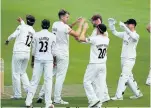  ??  ?? Lancashire’s Tom Bailey celebrates dismissing Mark Stoneman