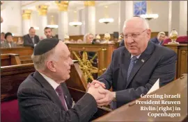  ??  ?? Greeting Israeli President Reuven Rivlin (right) in Copenhagen