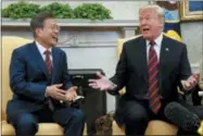  ?? EVAN VUCCI — THE ASSOCIATED PRESS ?? President Donald Trump meets with South Korean President Moon Jae-In in the Oval Office of the White House, Tuesday in Washington.