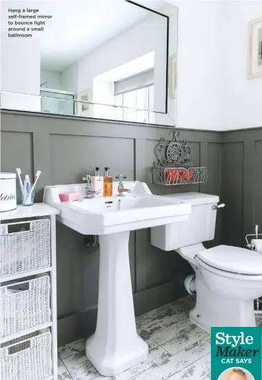  ??  ?? Hang a large self-framed mirror to bounce light around a small bathroom