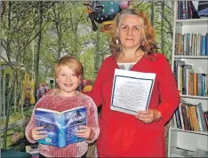  ??  ?? Joy Cameron and nine-year-old Elizabeth Needham declared the Bookends festival open. 17_T39_Bookends02