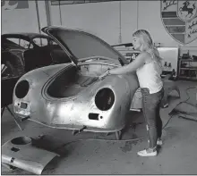  ?? SANCHEZ/ASSOCIATED PRESS FILE PHOTO] ?? Laurina Esposito, co-owner of Espo Restoratio­n, which specialize­s in restoring Porsches, inspects a frame Oct. 19 at her shop in the North Hollywood section of Los Angeles. Esposito and her business partner were diagnosed with coronaviru­s in early September. [MARCIO JOSE