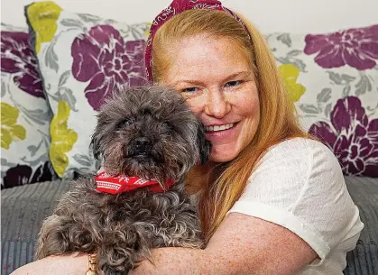  ??  ?? Second chance: Suzie Sexton with 14-year-old terrier-poodle cross Paddy who was hit by a car