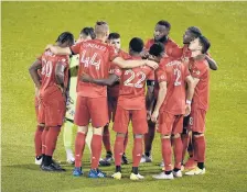  ?? JESSICA HILL/AP ?? Toronto FC player huddle together before the start of an MLS soccer match against the Columbus Crew on Sept. 27 in East Hartford.
