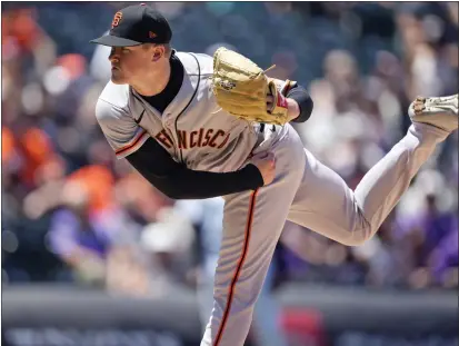  ?? PHOTOS BY DAVID ZALUBOWSKI — THE ASSOCIATED PRESS ?? The Giants’ pitcher Logan Webb works against the Colorado Rockies in the first inning Wednesday.