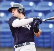  ?? Douglas P. DeFelice / Getty Images ?? The Yankees’ Luke Voit swings at a pitch against the Blue Jays during a spring training game at TD Ballpark on Sunday in Dunedin, Fla.