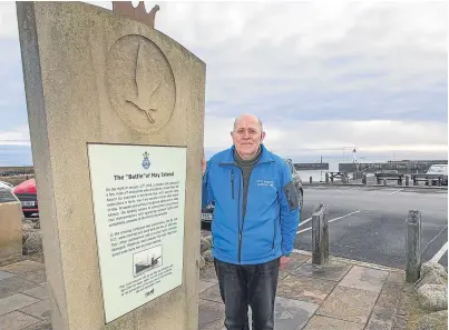  ?? Picture: Steven Brown. ?? Martin Dibley, secretary of Anstruther Community Council, at the memorial to the “Battle of May Island”, which happened 100 years ago this month.