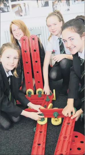  ??  ?? From left, Lucy Salkeld, 12, Katie Starkey, 13, Casey Milburn, 13, and Rose Heward, 13, take part in exercises organised by the Jon Egging Trust at Northaller­ton School and Sixth Form College.