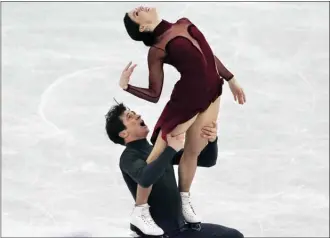  ?? Canadian Press file photo ?? Tessa Virtue and Scott Moir of Canada perform during the ice dance free dance event at last December’s ISU Grand Prix of Figure Skating final in Nagoya, Japan. The veteran ice dancers, who will close their competitiv­e career at the Pyeongchan­g...